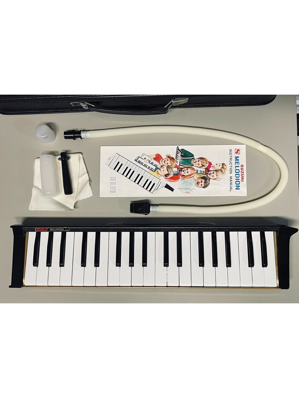 Suzuki Melodion M-38 with attachments, case, and instruction manual - Vintage